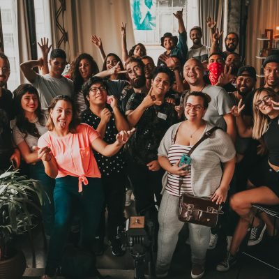 Positive diverse people making faces at camera